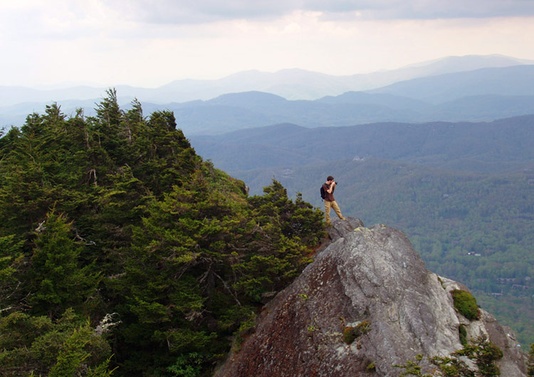Photographing the landscape from the summit of Grandfather Mountain.